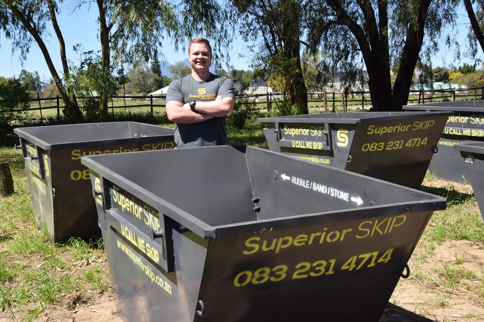 Superior Skip trailer delivering a skip bin to a customer