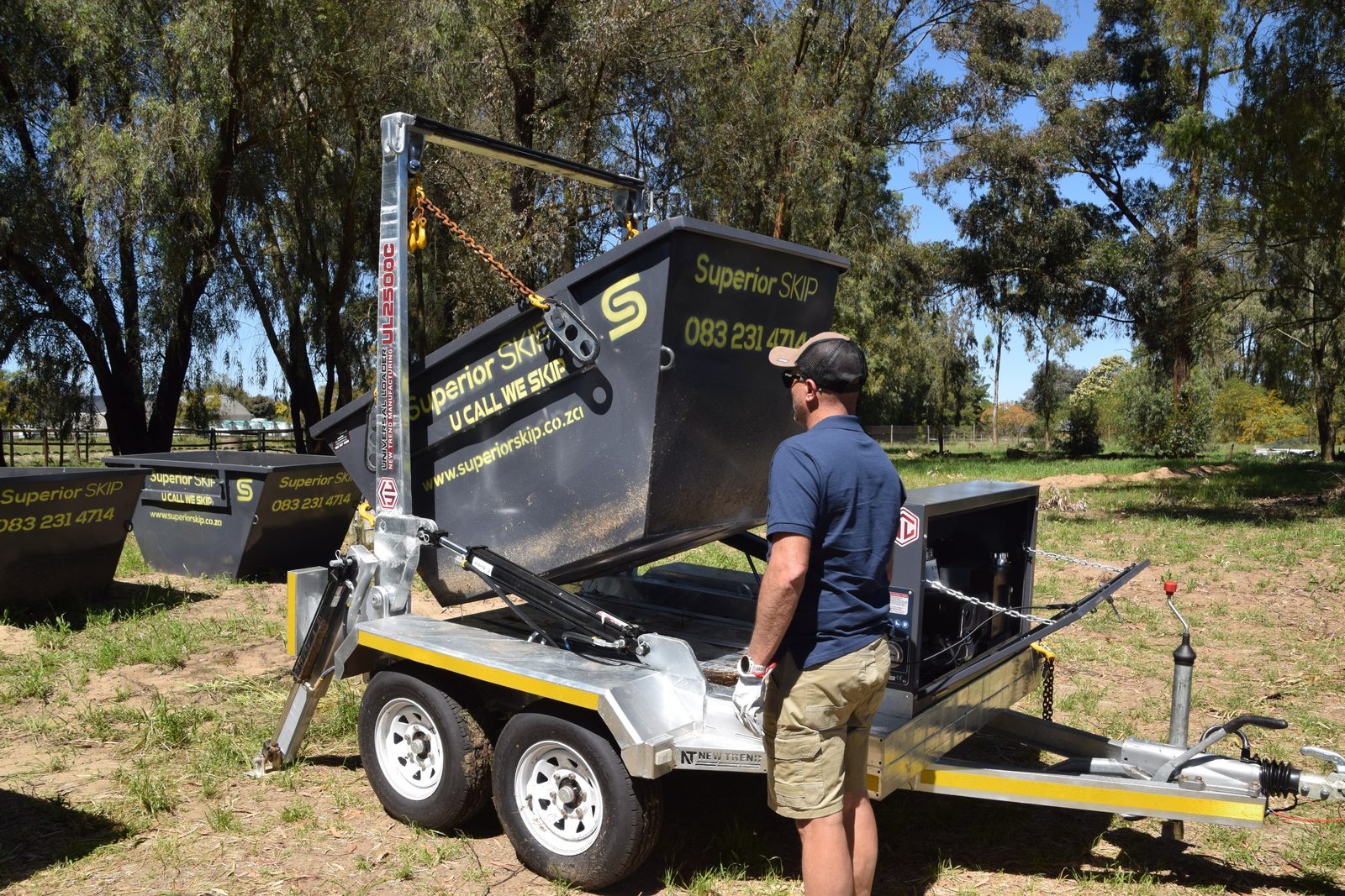Superior Skip crew collecting a full skip bin